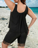 Tankini top and mid-thigh shorts