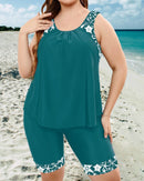 Tankini top and mid-thigh shorts