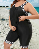 Tankini top and mid-thigh shorts