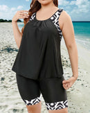 Tankini top and mid-thigh shorts