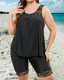 Tankini top and mid-thigh shorts