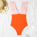 V-neck swimsuit with tummy control