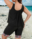 Tankini top and mid-thigh shorts