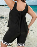 Tankini top and mid-thigh shorts