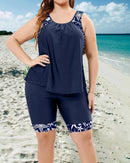 Tankini top and mid-thigh shorts